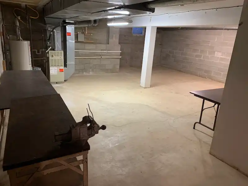 Cranford basement cleared to the concrete floor after an estate cleanout