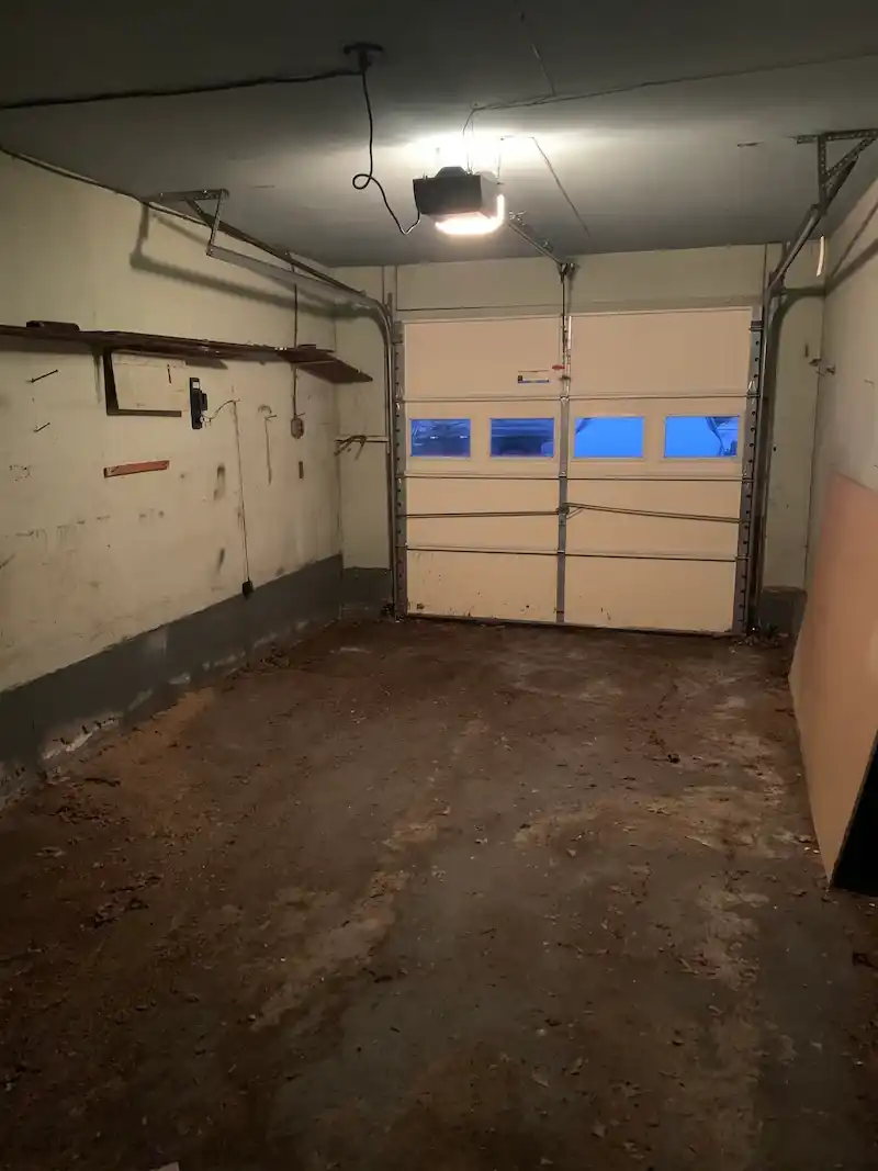 The same Morristown garage emptied and swept down to the concrete floor