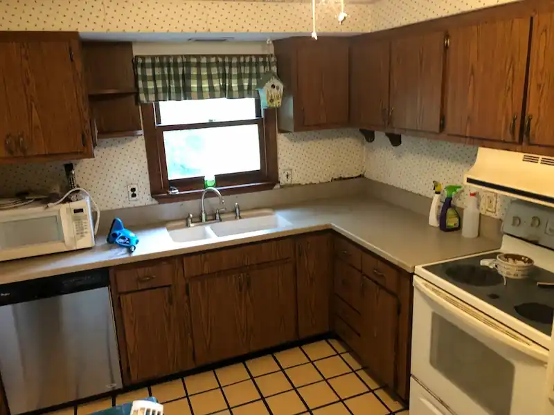 The same Willingboro kitchen with clear counters and a clean tile floor