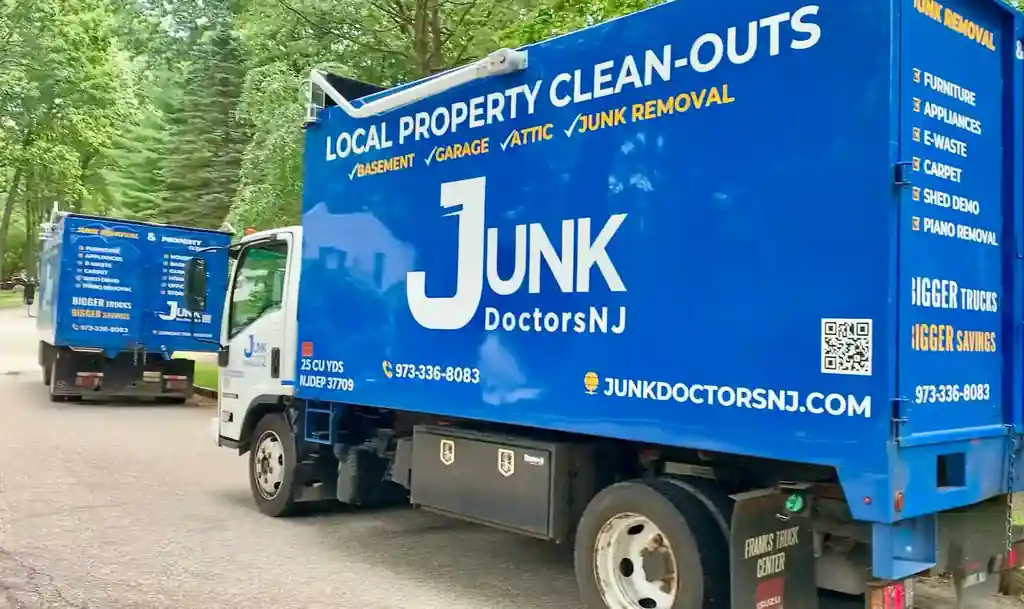 JunkDoctors 25 cubic yard truck parked on a tree-lined New Jersey street